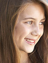 photo of a smiling teenage girl